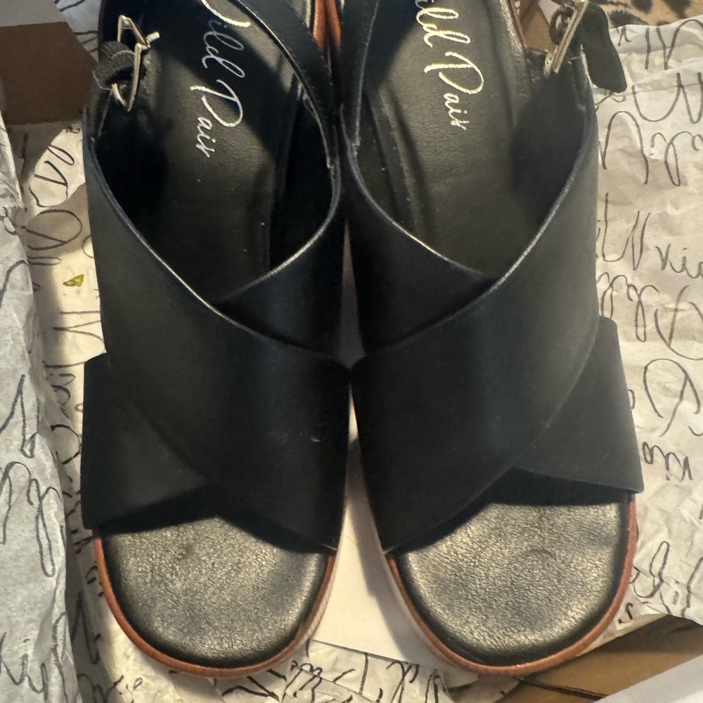 Black Sandals by Wild Pair